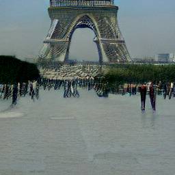 1: The Eiffel Tower, from a plaza at its base. Blue but smoggy sky.